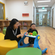 Ju Myung-hee in the playroom with her baby at the Happy Mom Center.